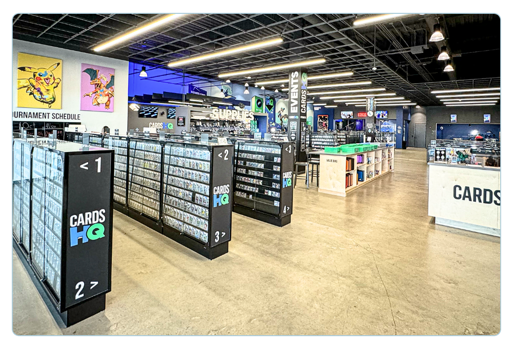 Trading card store with illuminated displays for graded cards and collectibles